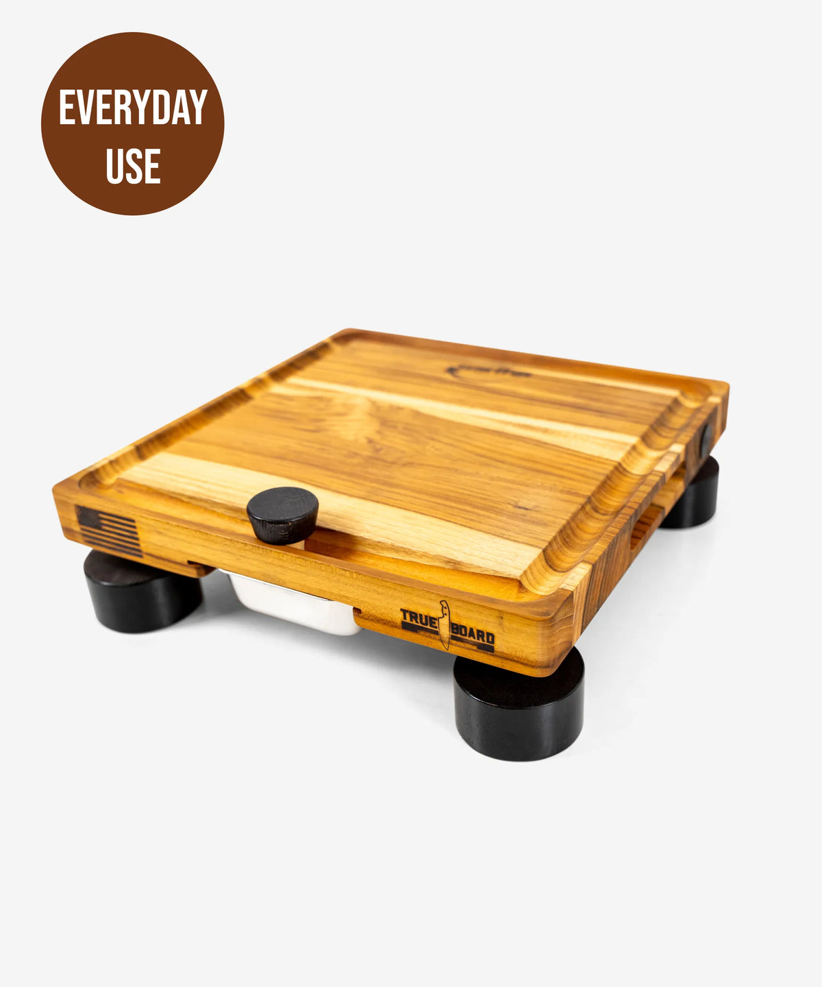 Wooden cutting board with black legs on a white background, featuring 'Everyday Use' label.