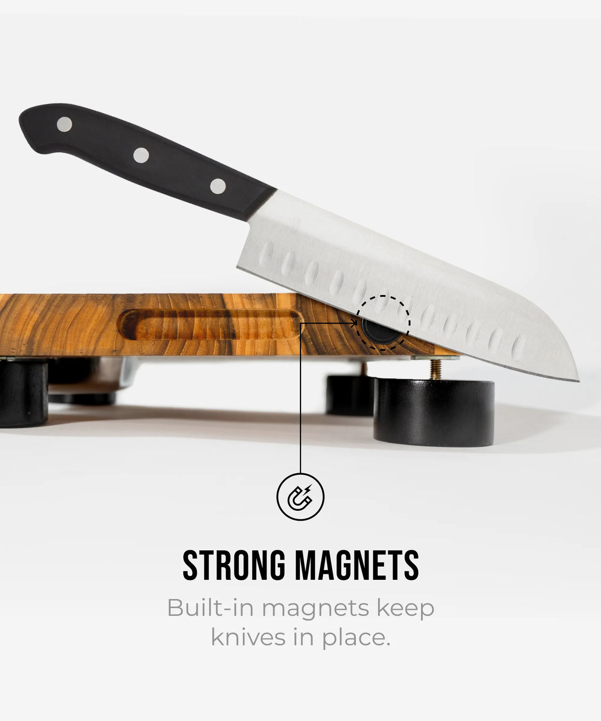 Knife on a magnetic strip with text highlighting built-in magnet