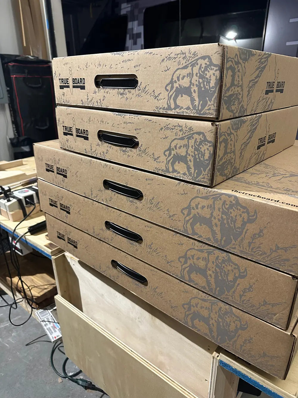 The True Board shipping boxes, hand-finished and stacked in Redondo Beach