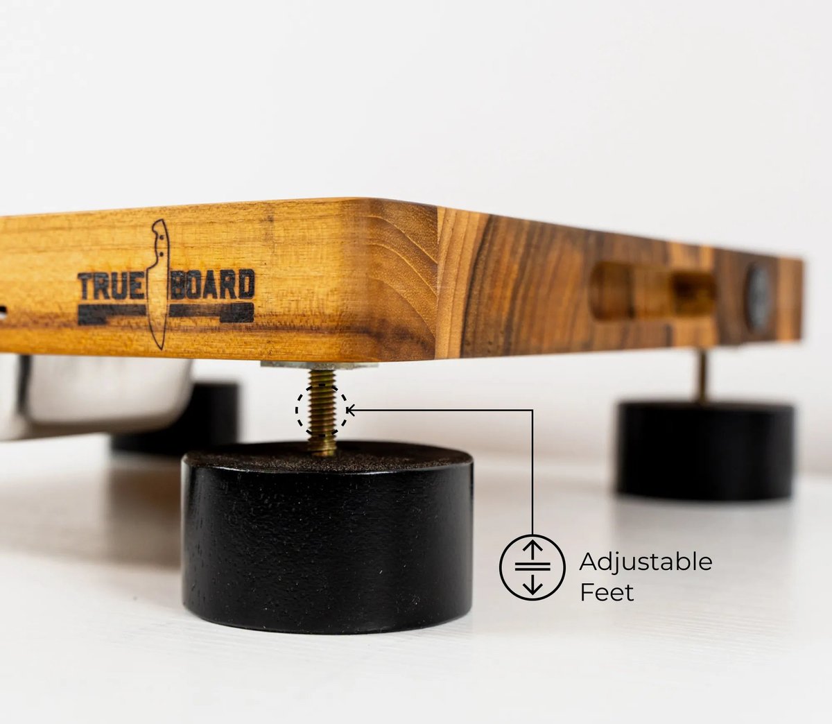 Adjustable foot under the corner of The True Board
