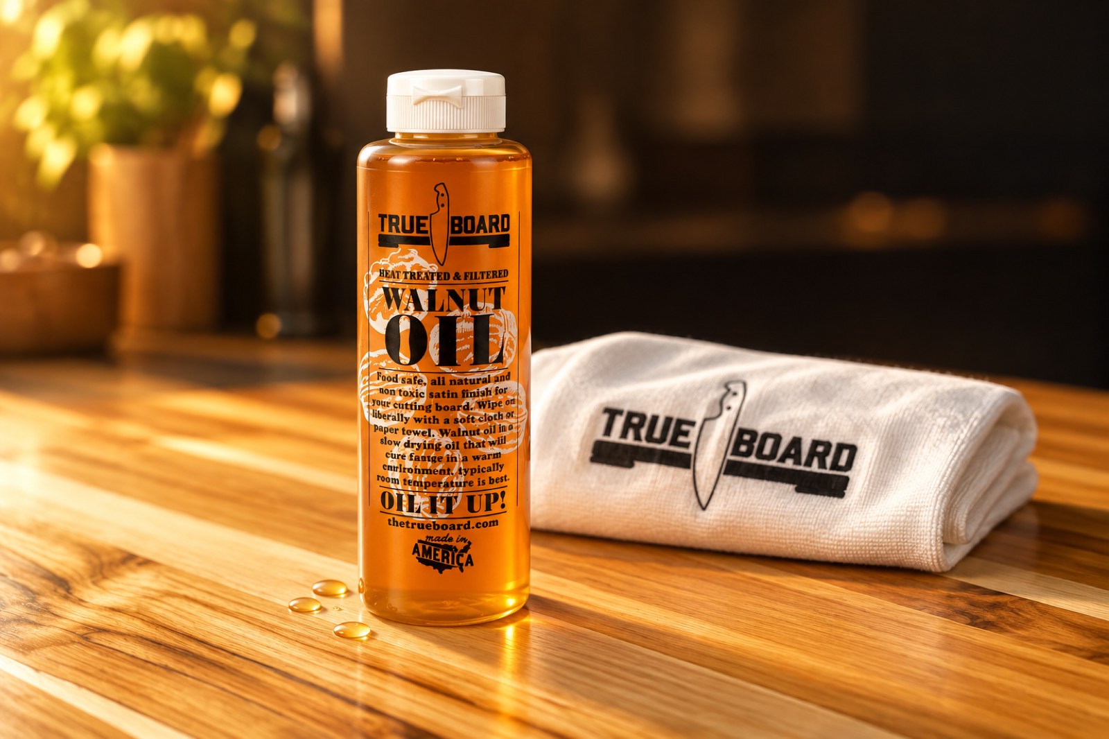 True Board walnut oil bottle next to a folded True Board towel on oiled teak