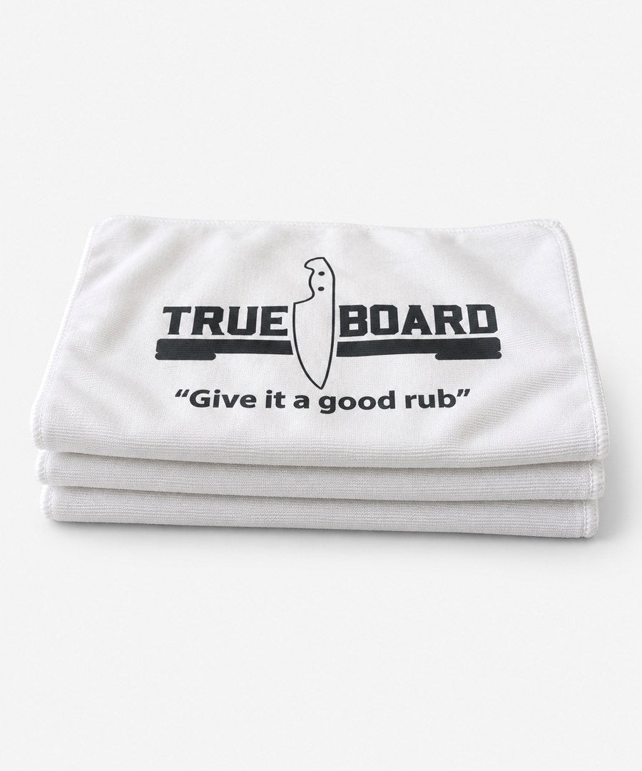 Three True Board towels folded and stacked